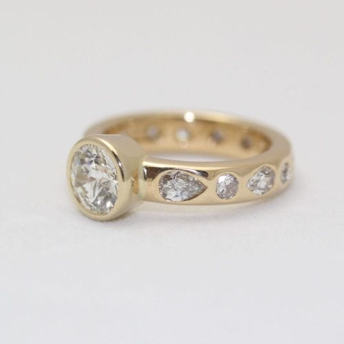 Solitaire Diamond Ring with Flush Set Diamonds